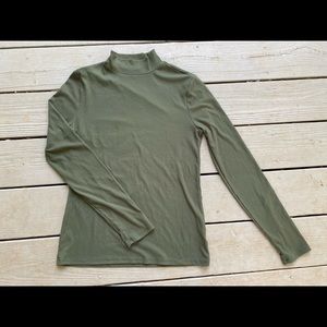 Women’s green mock turtle neck